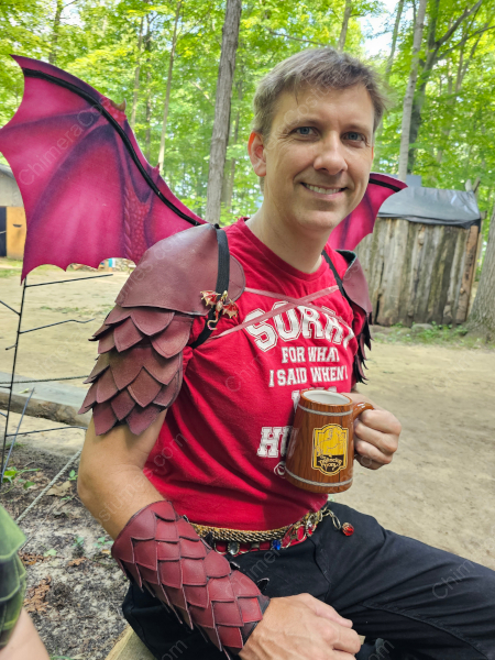 An image featuring elaborate Renaissance fair pauldrons, crafted with intricate detailing and ornate designs, evoking the essence of medieval splendor and fantasy cosplay.