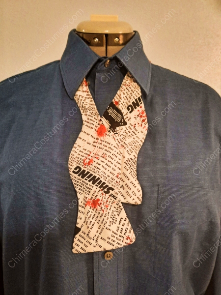 A unique bowtie featuring the iconic dragon design found on the Marriott carpet, making it the perfect accessory for Dragon Con enthusiasts looking to pay homage to the convention's iconic venue in their attire.